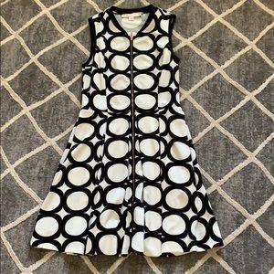 Black and white front zip dress